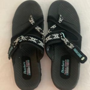 Skechers size a black and white sandals